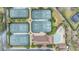Aerial view of community pool and tennis courts at 3096 Lansing Way, The Villages, FL 32162