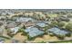 Aerial view of community tennis courts and pool at 3096 Lansing Way, The Villages, FL 32162