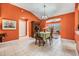 Dining area with a view of kitchen and living room at 3096 Lansing Way, The Villages, FL 32162
