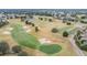 Aerial view of a lush green golf course at 3096 Lansing Way, The Villages, FL 32162