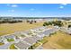Aerial view highlighting the home's curb appeal and neighborhood at 8638 Triumph Cir, Wildwood, FL 34785