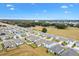 Aerial view showing the house's location in a neighborhood at 8638 Triumph Cir, Wildwood, FL 34785