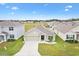 One-story house in a residential neighborhood at 8638 Triumph Cir, Wildwood, FL 34785