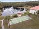 Community shuffleboard courts and gazebo near pond at 3004 Granada Ct # 3004, Lake Wales, FL 33898