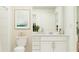 Clean bathroom with white vanity and updated fixtures at 4212 Singing Mockingbird Blvd, Bartow, FL 33830