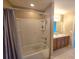 Clean bathroom with shower/tub combo and vanity at 2157 Geneva Dr, Lakeland, FL 33805