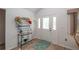 Bright entryway with wood-look floors and decorative hat rack at 10984 Sw 81St Ave, Ocala, FL 34481