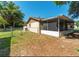 House with screened porch and fenced backyard at 5018 Se 106Th Pl, Belleview, FL 34420