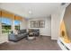 Bright recreation room with sectional sofa and natural light at 3468 Dahlia Dr, Lake Hamilton, FL 33851
