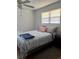 Bright bedroom with double bed and ceiling fan at 1268 Cr 436, Lake Panasoffkee, FL 33538