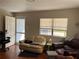 Bright living room with comfy seating at 1268 Cr 436, Lake Panasoffkee, FL 33538