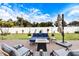 Relaxing backyard patio with fire pit and seating area at 2954 Flying Blackbird Rd, Bartow, FL 33830