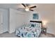 Bedroom with ceiling fan and double door closet at 2954 Flying Blackbird Rd, Bartow, FL 33830