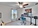 Bedroom with window, ceiling fan, and large closet at 2954 Flying Blackbird Rd, Bartow, FL 33830