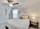 Spacious main bedroom with a king-size bed and ensuite access at 2954 Flying Blackbird Rd, Bartow, FL 33830