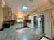 Modern kitchen with stainless steel appliances and granite countertops at 3109 Sand Trap Ct, Lakeland, FL 33810