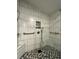 Walk-in shower with bench seating and grab bars at 3109 Sand Trap Ct, Lakeland, FL 33810