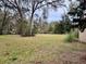 Spacious backyard with mature trees at 2450 Ne 40Th St, Ocala, FL 34479