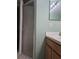 Clean bathroom with shower stall, vanity, and mirror at 619 Parakeet Ct, Kissimmee, FL 34759