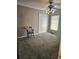 Bedroom with chair, closet, and carpeted floor at 619 Parakeet Ct, Kissimmee, FL 34759