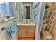 Clean bathroom with a single sink vanity and toilet at 706 Lake Diamond Ave, Ocala, FL 34472