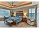 Spacious Primary bedroom with a king-size bed and ensuite bathroom at 706 Lake Diamond Ave, Ocala, FL 34472