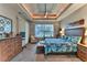 Large bedroom with king-size bed, ample closet space, and dresser at 706 Lake Diamond Ave, Ocala, FL 34472