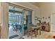 Casual breakfast nook with pool view, adjacent to kitchen at 706 Lake Diamond Ave, Ocala, FL 34472