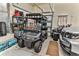 Garage with golf cart and additional storage at 706 Lake Diamond Ave, Ocala, FL 34472