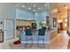 Modern kitchen with granite countertops and stainless steel appliances at 706 Lake Diamond Ave, Ocala, FL 34472
