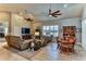 Spacious living room with comfortable seating and large TV at 706 Lake Diamond Ave, Ocala, FL 34472
