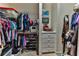 Large walk-in closet with ample shelving and hanging space at 706 Lake Diamond Ave, Ocala, FL 34472