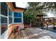 Wooden back deck with access to the backyard at 1100 Lowry Ave # 7, Lakeland, FL 33801