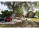 Large backyard with playset and storage shed at 1100 Lowry Ave # 7, Lakeland, FL 33801