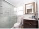 Updated bathroom with a walk-in shower and modern vanity at 1100 Lowry Ave # 7, Lakeland, FL 33801