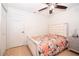 Bedroom with a queen bed and floral bedding at 1100 Lowry Ave # 7, Lakeland, FL 33801