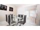 Kitchen dining area with glass table and gray chairs at 1100 Lowry Ave # 7, Lakeland, FL 33801
