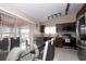 Modern kitchen with stainless steel appliances and glass table at 1100 Lowry Ave # 7, Lakeland, FL 33801