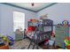 A bedroom with a bunk bed, themed decor, and ample storage at 2254 Wyndham Palms Way, Kissimmee, FL 34747