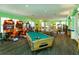 Bright game room with pool table, arcade games, and ping pong at 2254 Wyndham Palms Way, Kissimmee, FL 34747