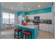 Modern kitchen with white cabinets, granite countertops, and island at 2254 Wyndham Palms Way, Kissimmee, FL 34747