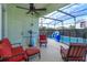 Relaxing screened pool area with patio furniture at 2254 Wyndham Palms Way, Kissimmee, FL 34747