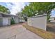 View of the backyard with a shed and small deck at 1412 E Main St, Lakeland, FL 33801