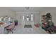 Welcoming entrance featuring a large tile foyer, ample shoe storage, and potential for a home office or vanity at 1412 E Main St, Lakeland, FL 33801