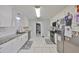 Bright kitchen with stainless appliances, ample counter space, and modern finishes for a culinary enthusiast's dream at 1412 E Main St, Lakeland, FL 33801