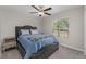 Bedroom featuring a ceiling fan, natural light, and neutral tones at 2133 Old Mining Rd, Lakeland, FL 33801