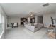 Bright, open-concept living space connecting the kitchen, dining area, and living room at 2133 Old Mining Rd, Lakeland, FL 33801