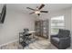 Bright and functional office space with a modern desk, chair, shelving, and ample natural light at 2133 Old Mining Rd, Lakeland, FL 33801