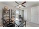 Bright home office featuring a desk, shelving unit, and comfortable seating, great for remote work at 2133 Old Mining Rd, Lakeland, FL 33801
