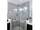 Bathroom with a walk-in shower and gray subway tile at 4035 Solamor St, Lakeland, FL 33810